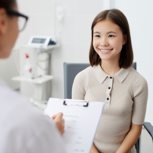 Dentist discussing individualized treatment plan with dental patient