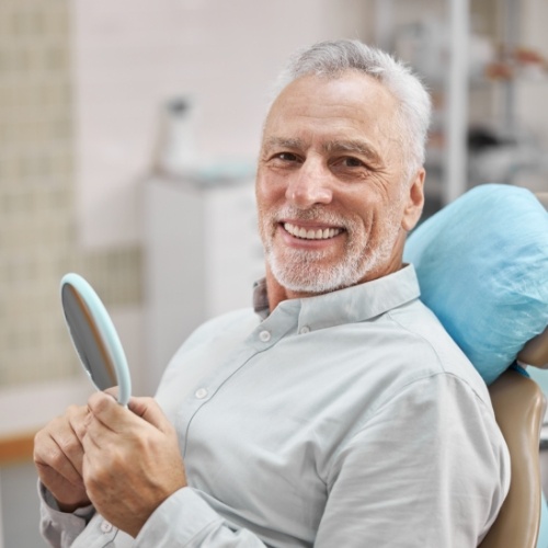 Man smiling in dental chair