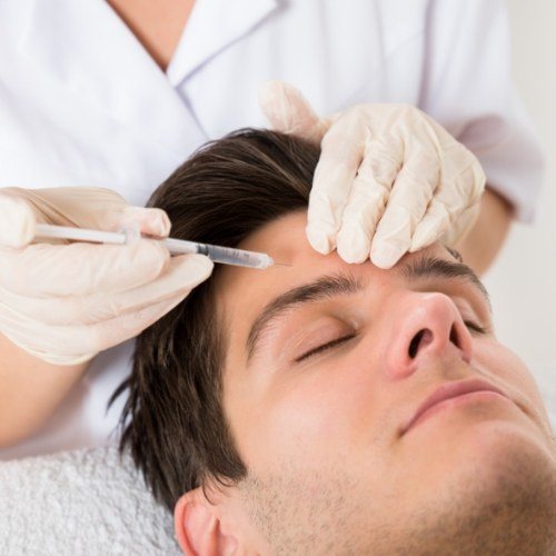 Man receiving Botox treatment