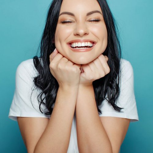 Lady smiles brilliantly