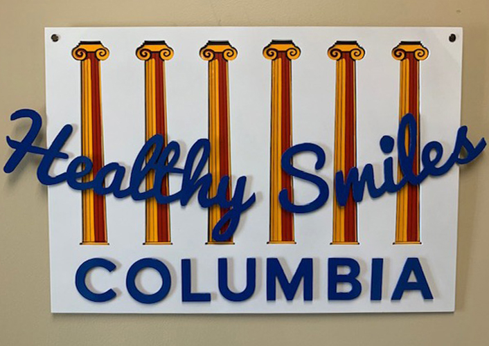 Healthy Smiles Columbia dental office sign
