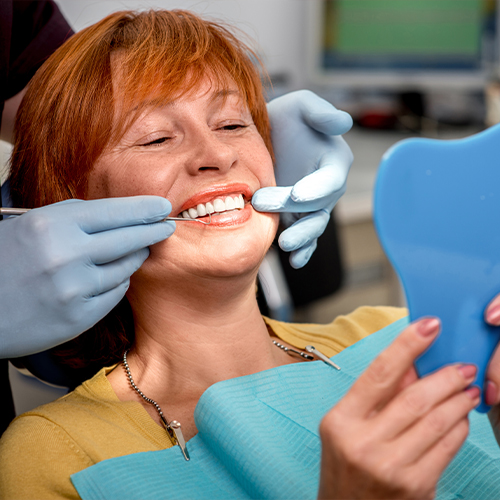 Dental patient receiving oral cancer screening