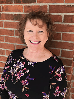 Dental patient care coordinator Carolyn