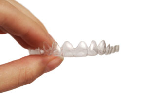 Your dentist offers Invisalign in Columbia to straighten your teeth.