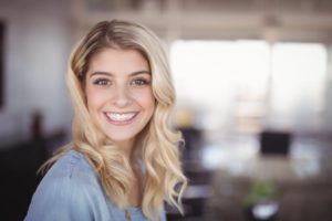 Woman smiling at work.